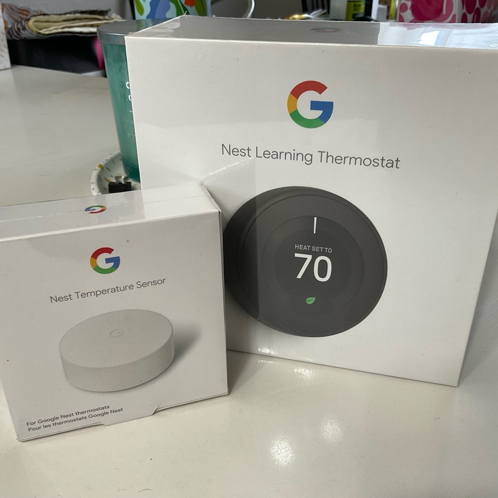 Google Nest Thermostat and Sensor in White and Black